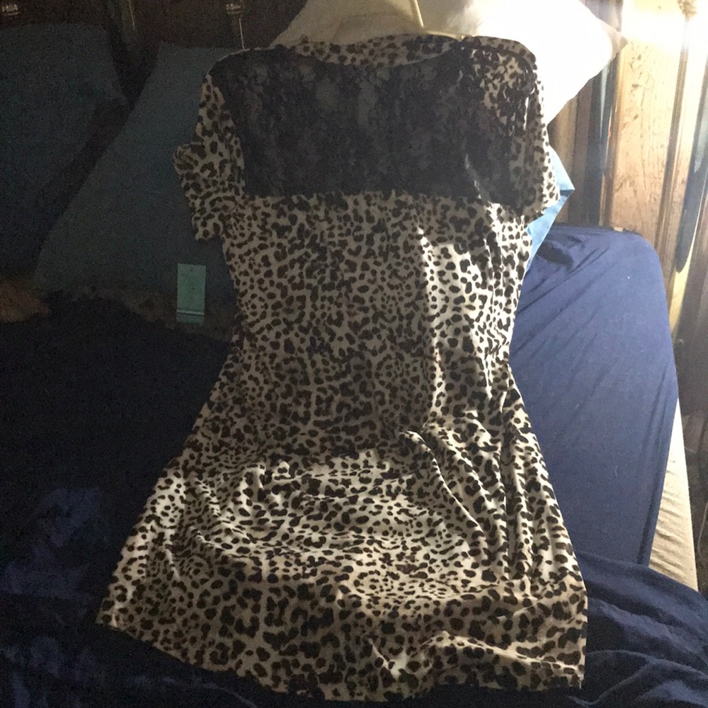 Short sleeve dress and goes down to the knees